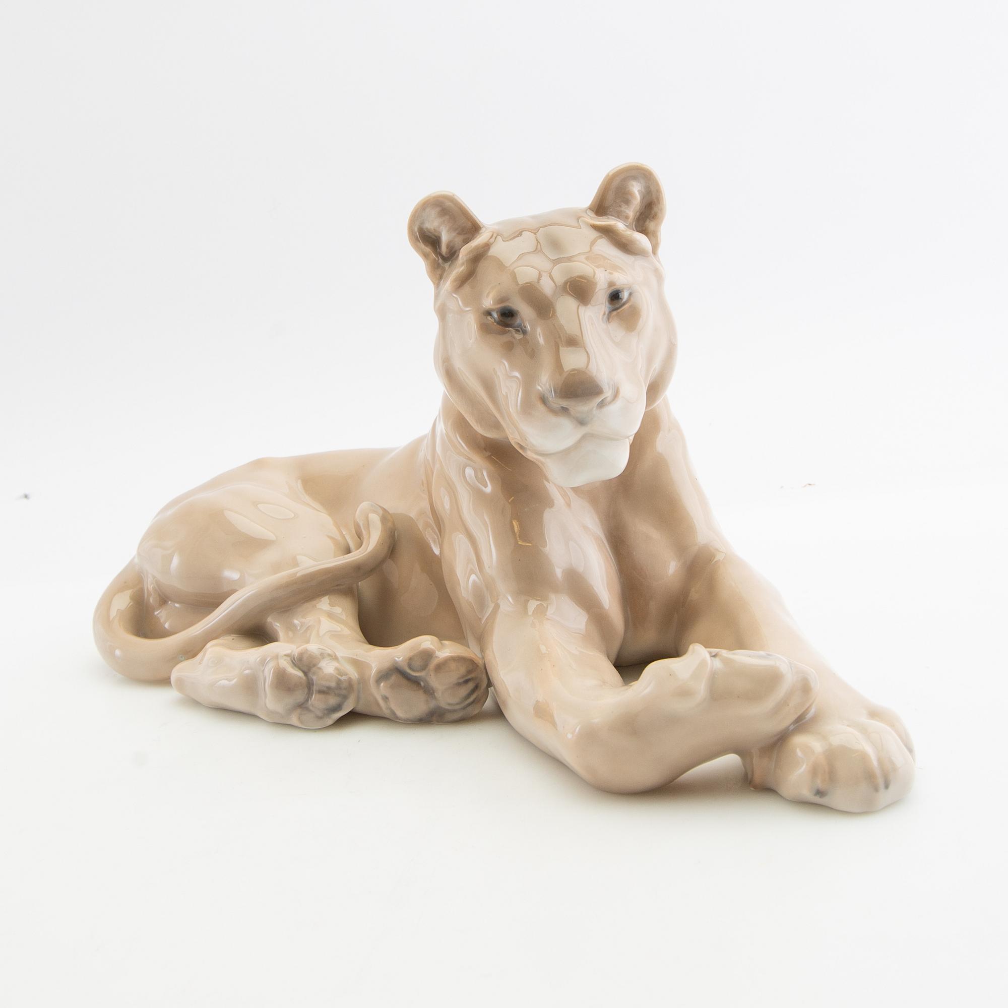 Figurine of a reclining lioness Royal Copenhagen Denmark porcelain.