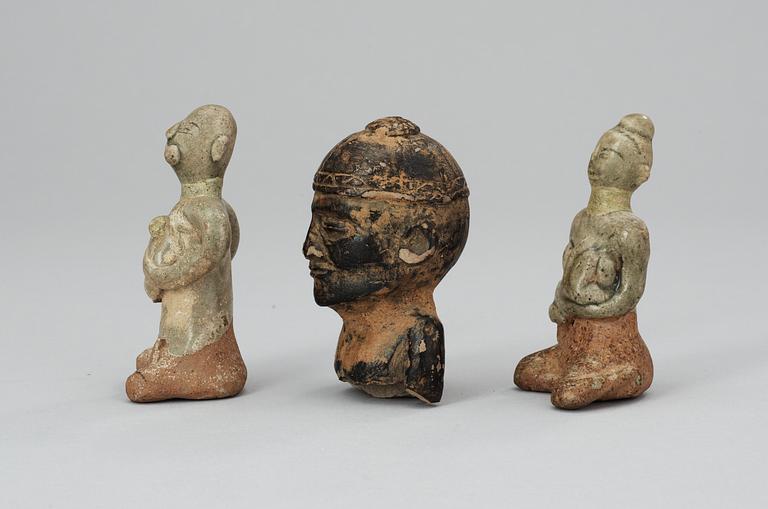 A set of three pottery figures, South America and Thailand.