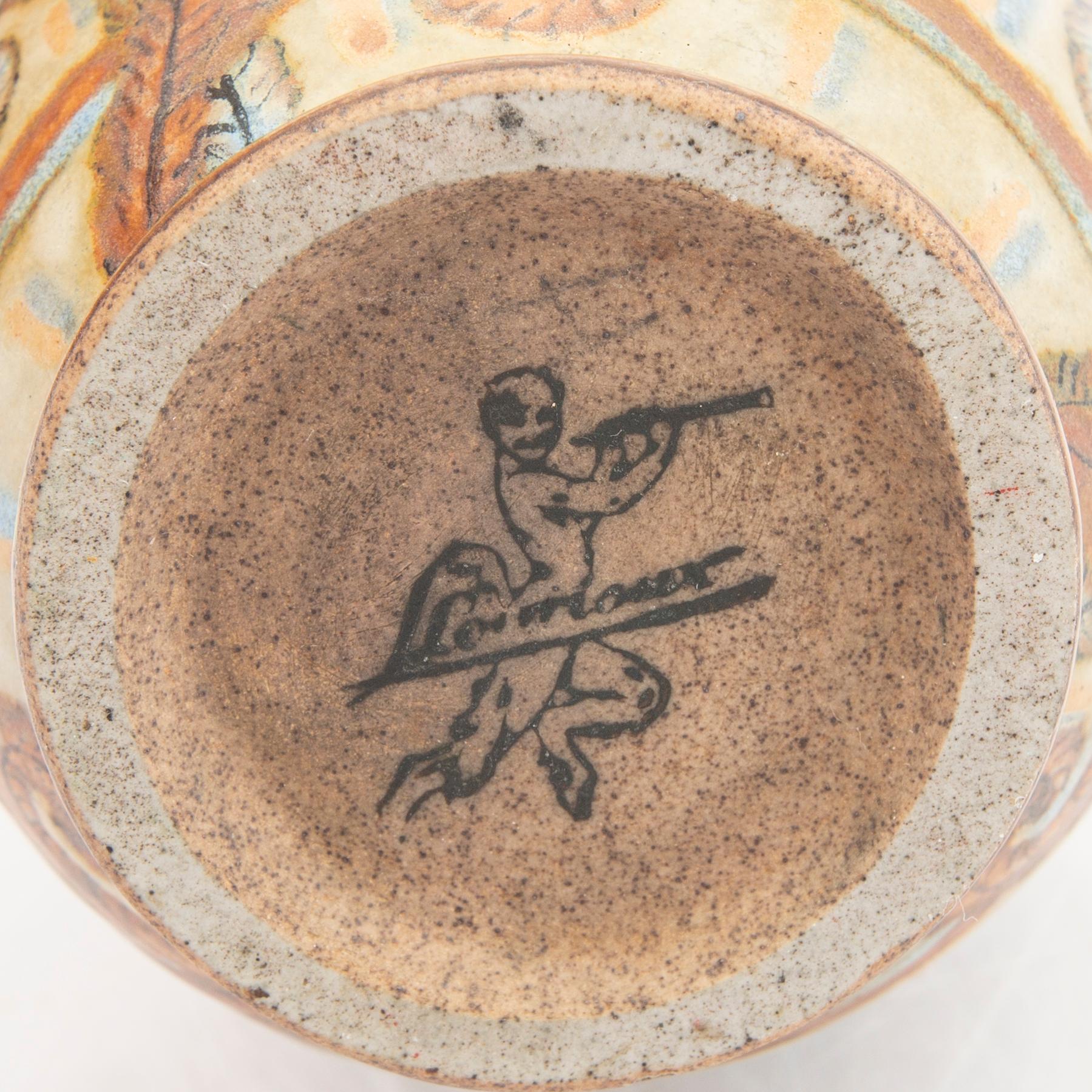 Louis Lourioux, a sig ned ceramic vase.