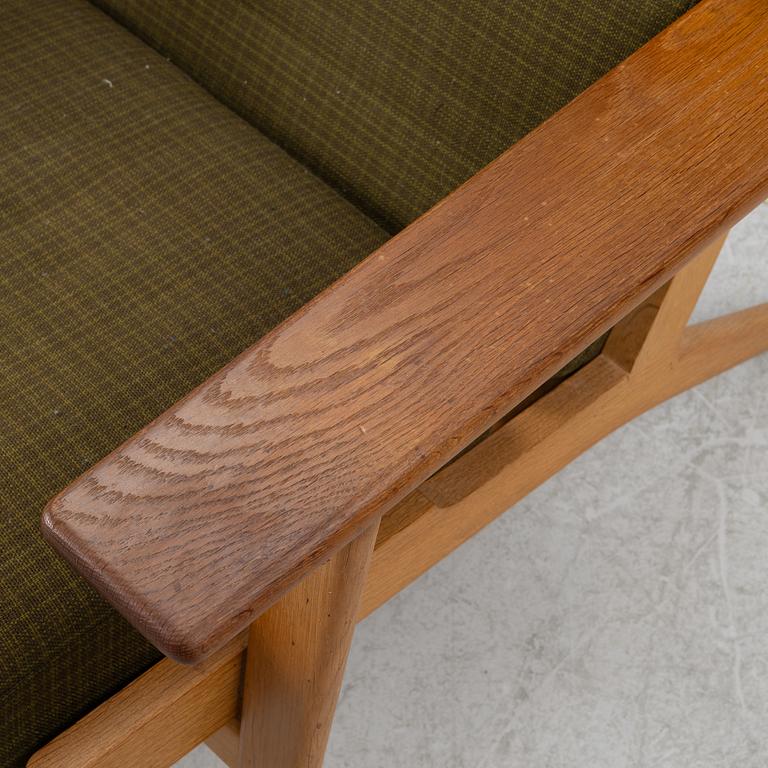 Hans J. Wegner, fåtölj med fotpall, "GE-290" Getama Gedsted, Danmark.