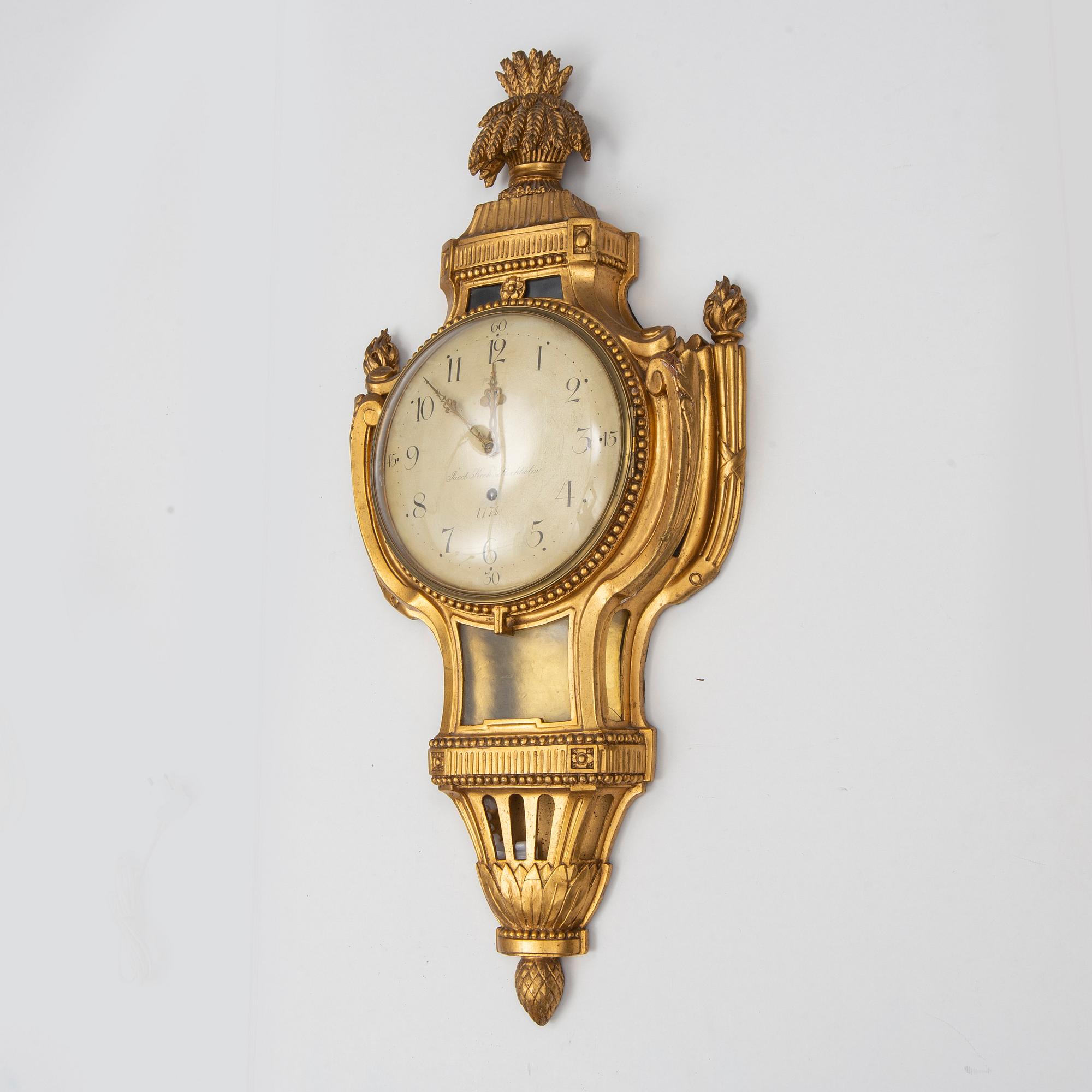 A gustavian wall clock by Jacob Kock, late 18th century.