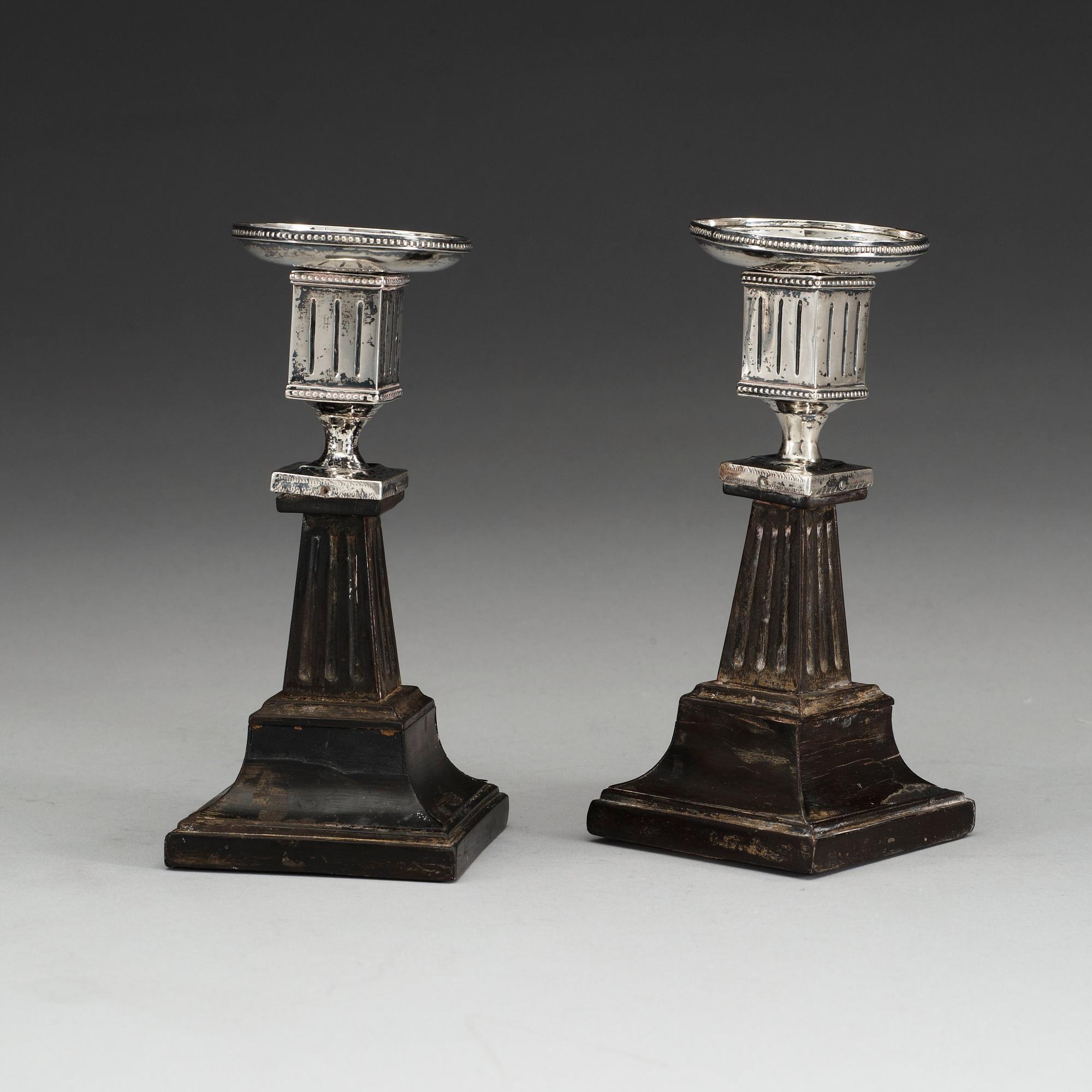 A pair of Swedish early 19th century silver and wood candlesticks, marks of Lorenz Georg Weis, Norrköping (1791-1829).