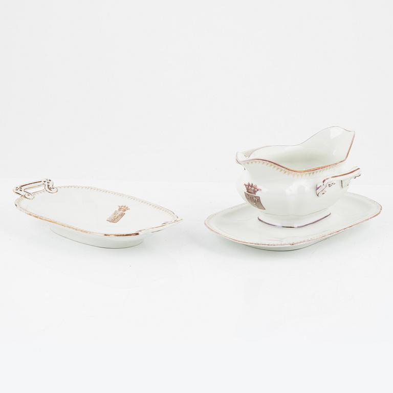 A 82 piece porcelin dinner service, France. With the Hamilton family coat of arms.