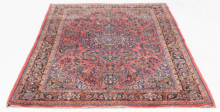 An American Sarouk rug, semi antique, c. 200 x 133 cm.