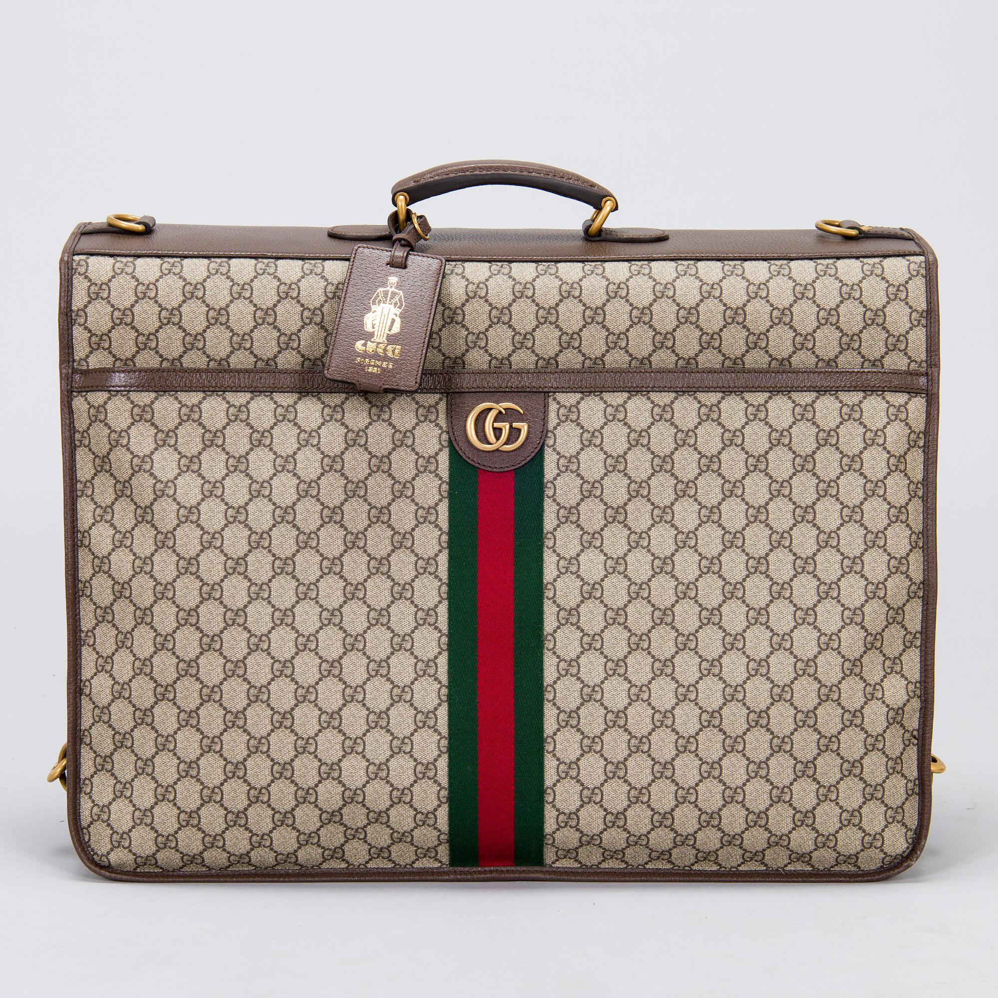 Gucci, a 'Savoy' garment bag.