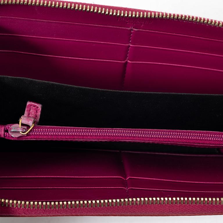 Yves Saint Laurent, a wallet.
