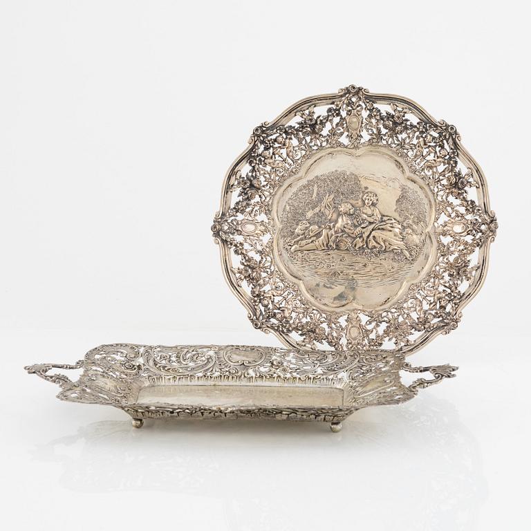 Two silver platters, presumably Wilhelm Weinranck, Hanau, and mock marks, Hanau, Germany, late 19th century.