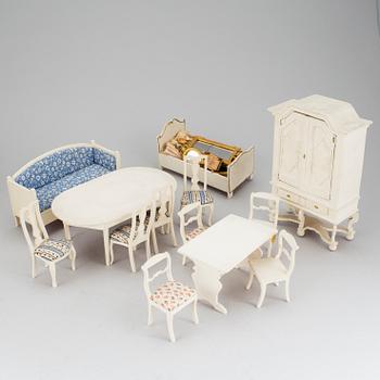 A lot of 32 pieces of doll house furniture from Nolbyn first half of the 20th century.