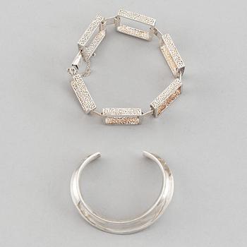Two silver bracelets, including Denmark.