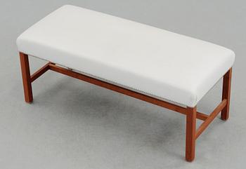 A Josef Frank cherry wood stool by Svenskt Tenn, model 2082.