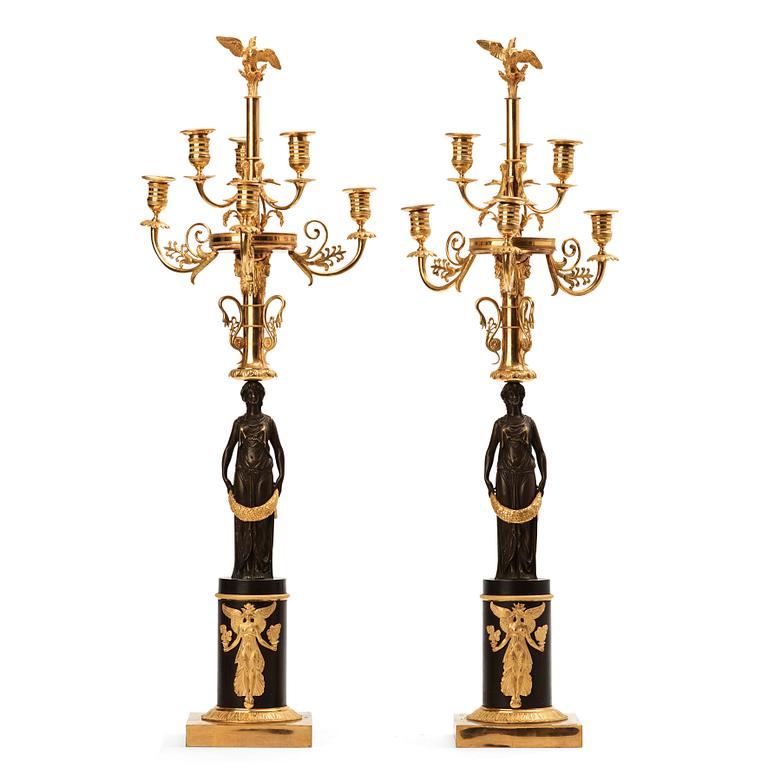 A pair of Empire early 19th century six-light candelabra.