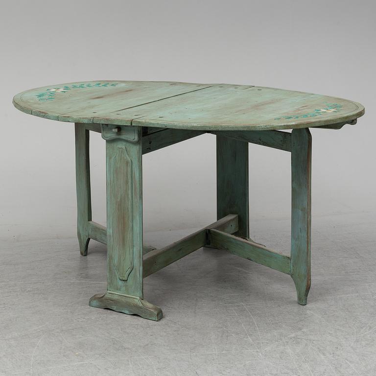 A 19th century gate leg table.