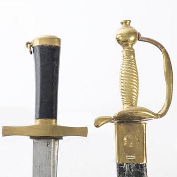 Two Swedish cutlasses, with scabbards, 1856 pattern.