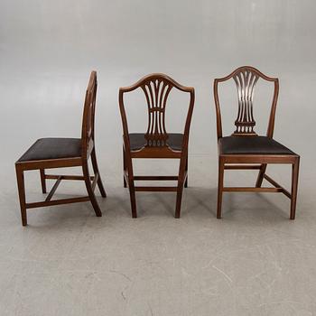 A set of six mahogany Hepplewhite style 20th century chairs.