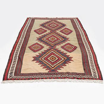 A Kilim carpet, c. 300 x 170 cm.