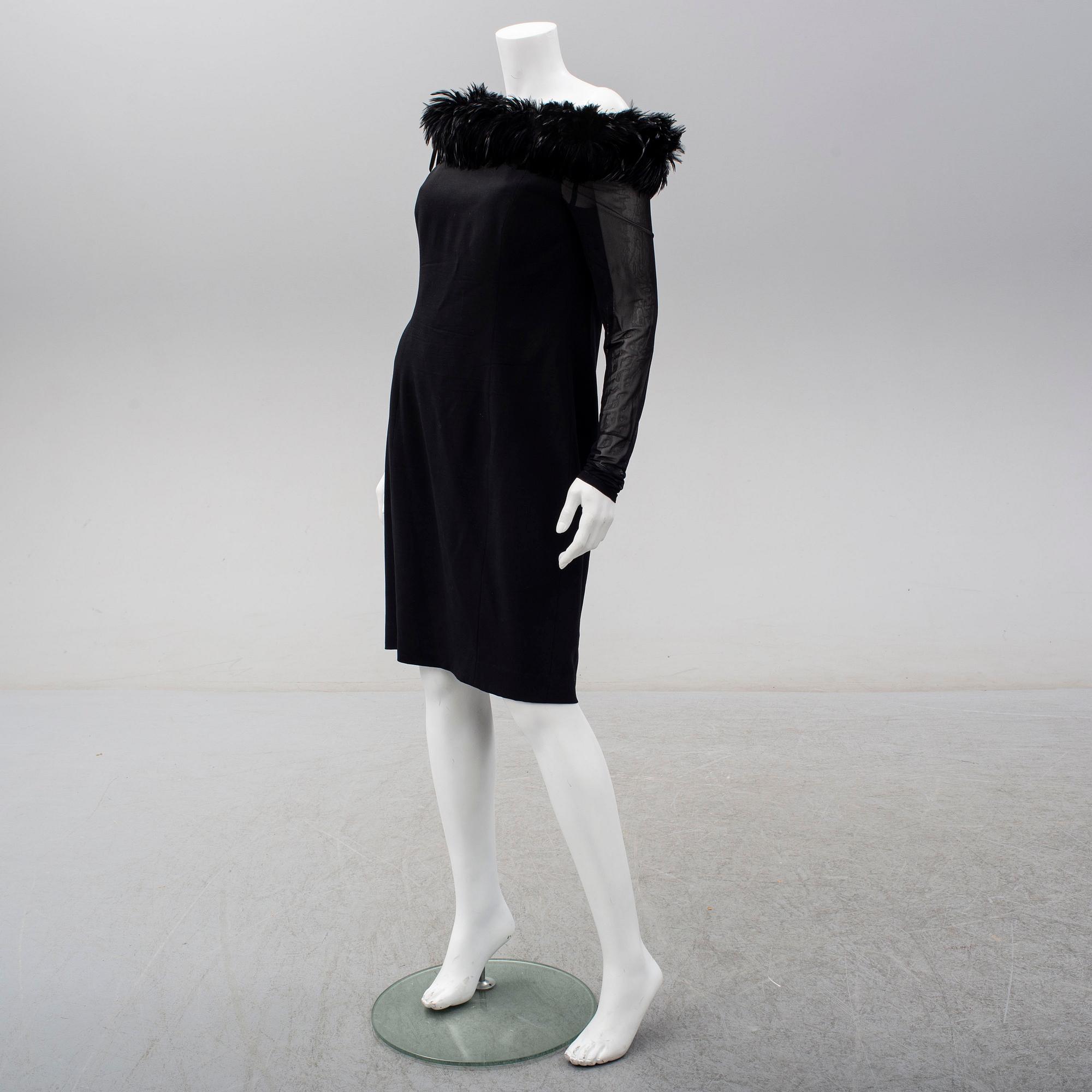 ESCADA COUTURE, a wool dress with feather collar, size 40.