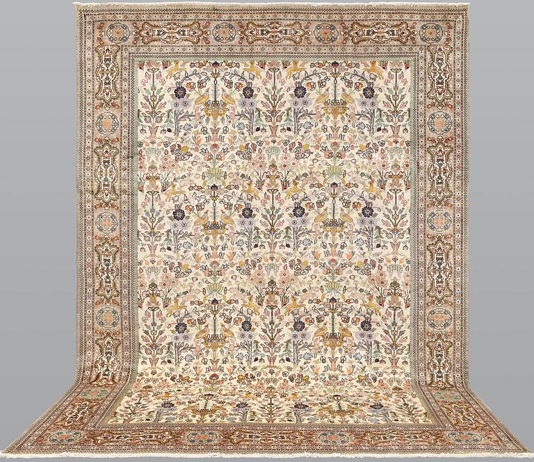 A Täbriz Tabatabai carpet, c.  352 x 240 cm.