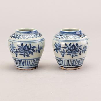 A pair of Chinese porcelain miniature jars, Ming dynasty (1368-1644).