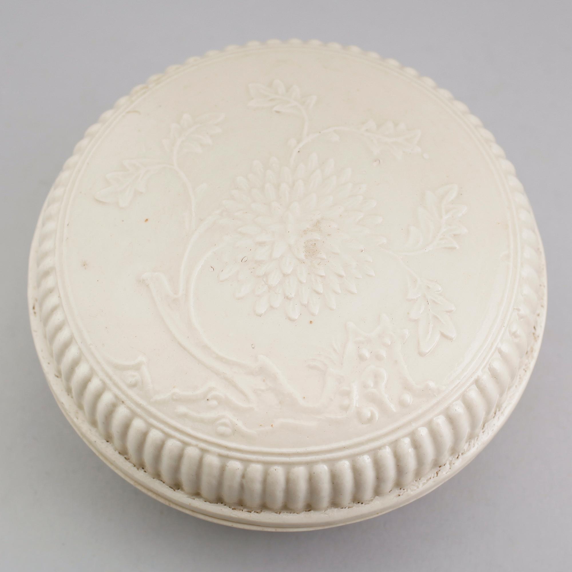 A white glazed peony flower box with cover, Ming dynasty (1368-1644).
