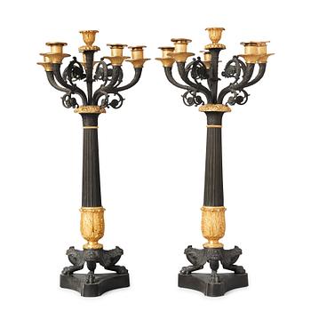 1285. A pair of French late Empire 19th century six-light candelabra.