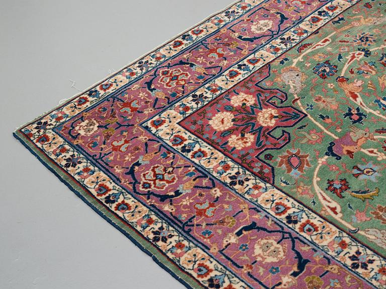 A carpet, a semi-antique Tabriz, ca 374-376,5 x 268-276 cm.