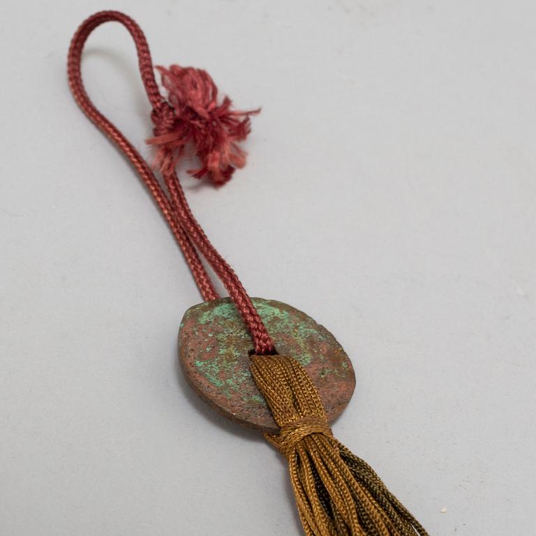Eight (6+2) tassles, porcelain and bronze, Japan, 20th century.