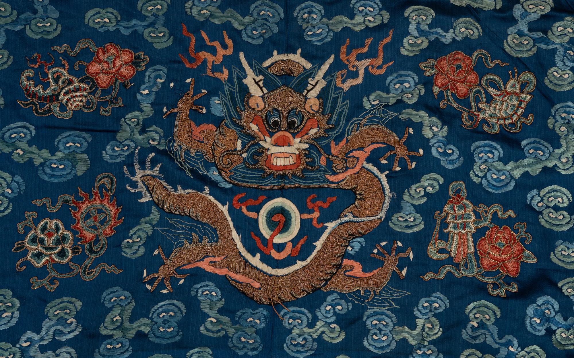 A Chinese embroidered silk robe, Qing dynasty, 19th Century.