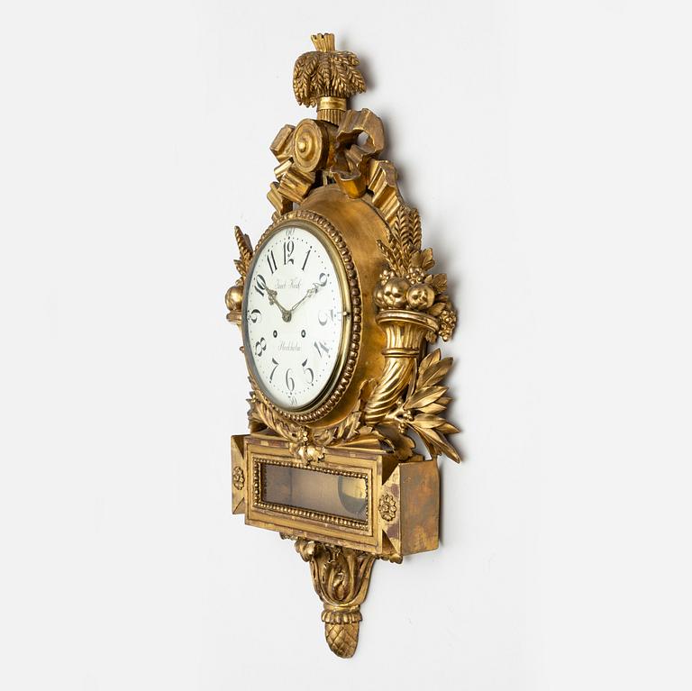 A gilt Gustavian wall clock, Jacob Kock (Royal Clockmaker in Stockholm 1762-1803).