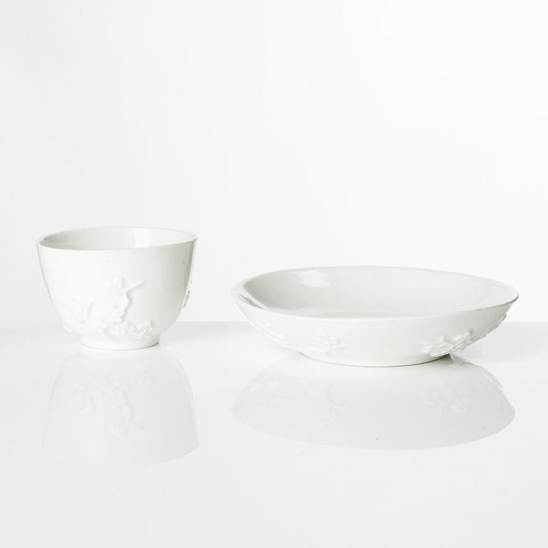 A blanc de Chine cup with saucer, Meissen, 18th century.