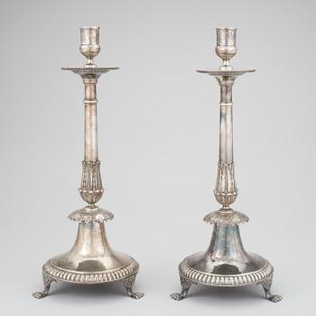 A pair of silver empire candlesticks by Aldolf Zethelius, Stockholm 1821 & 1824. 1284 g.