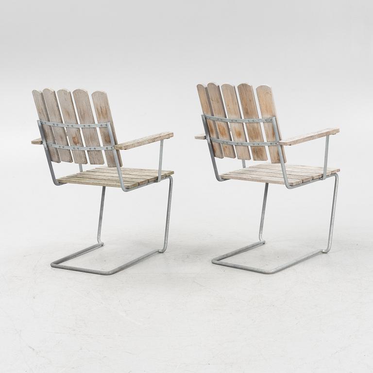 Arthur Lindquist, matbord och 8 karmstolar modell A2, Grythyttans stålmöbler, 2000-tal.