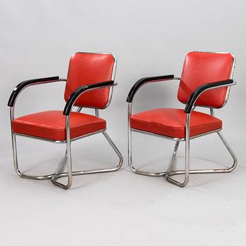 Two 1930/1940's armchairs / hairdressing chairs.