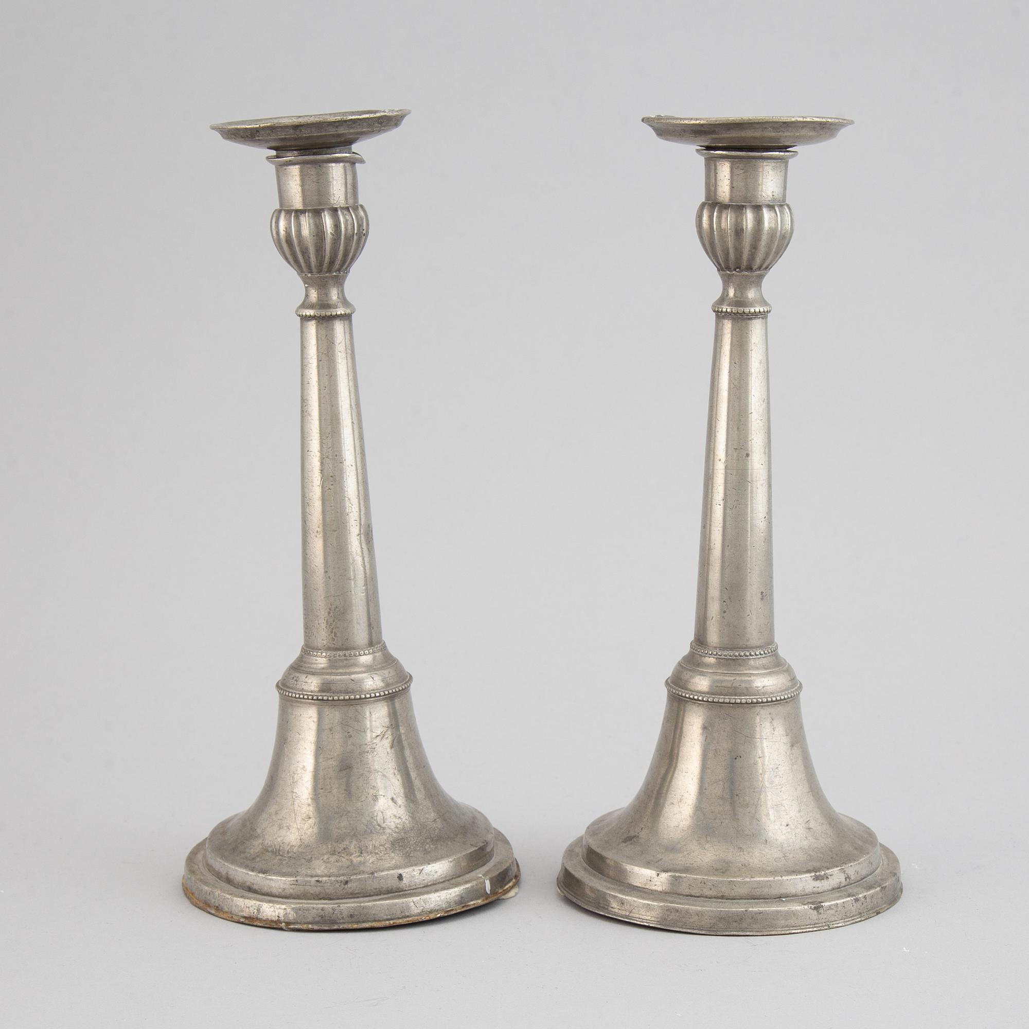 A pair of Swedish pewter candlesticks by Carl Bröske, Stockholm, 1840.