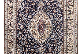 A carpet, Nain, part silk, 9 laa, ca. 285 x 200 cm.