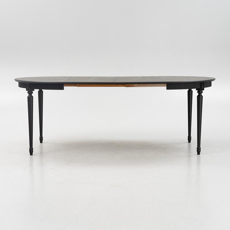 A Gustavian style dining table, mid 20th century.
