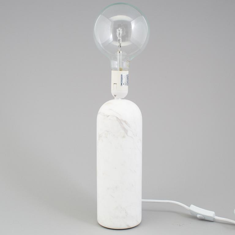 a "Kizu" table lamp by Lars Tornoe for New works.