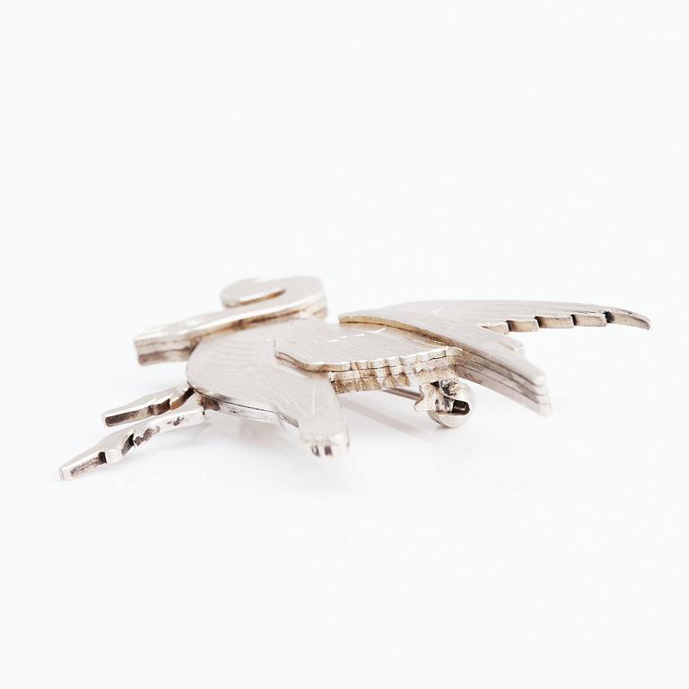 Wiwen Nilsson, a sterling silver brooch of a flying goose, Lund 1961, nr 8.