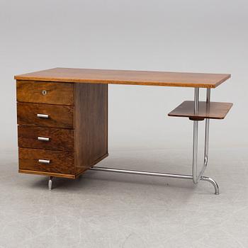 A 1930s writing desk by Jindrich Halabala and chair by Mart Stam.