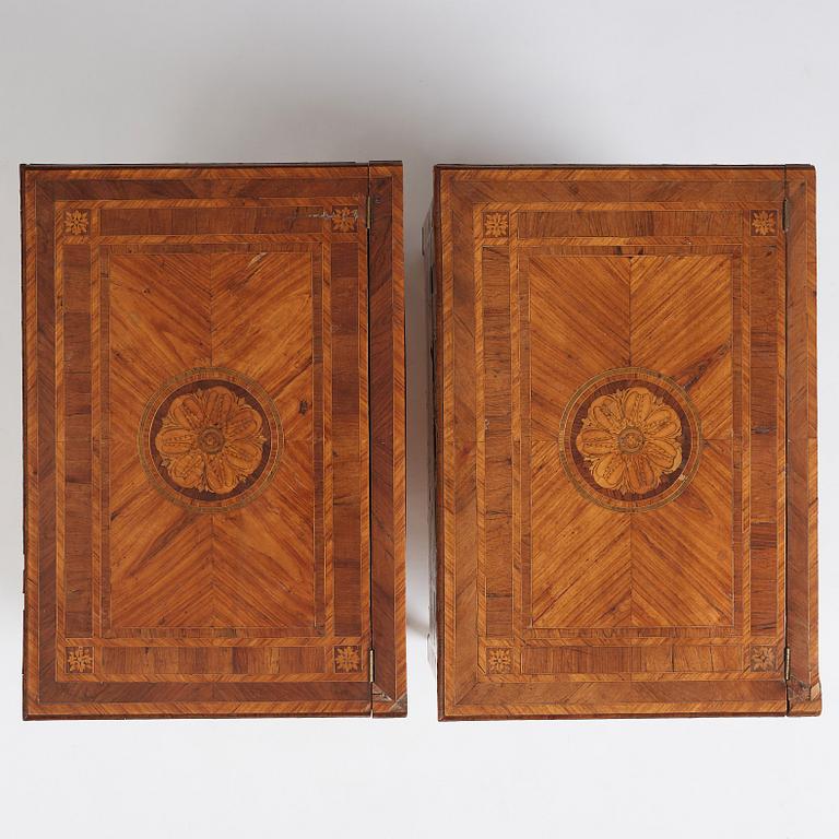 A pair of Italian Louis XVI cabinets, late 18th century.