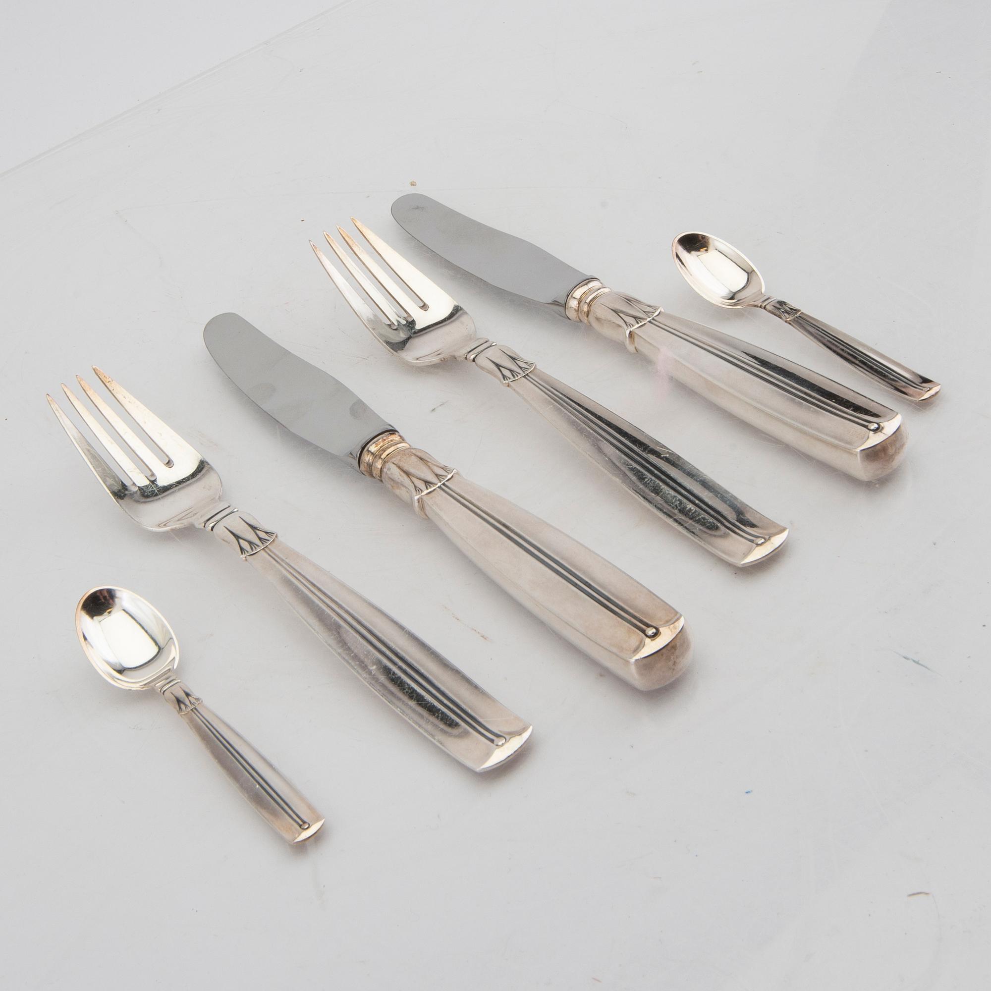 A dansih 20th century set of 18 pcs of silver cutlery  total weight 938 grams.