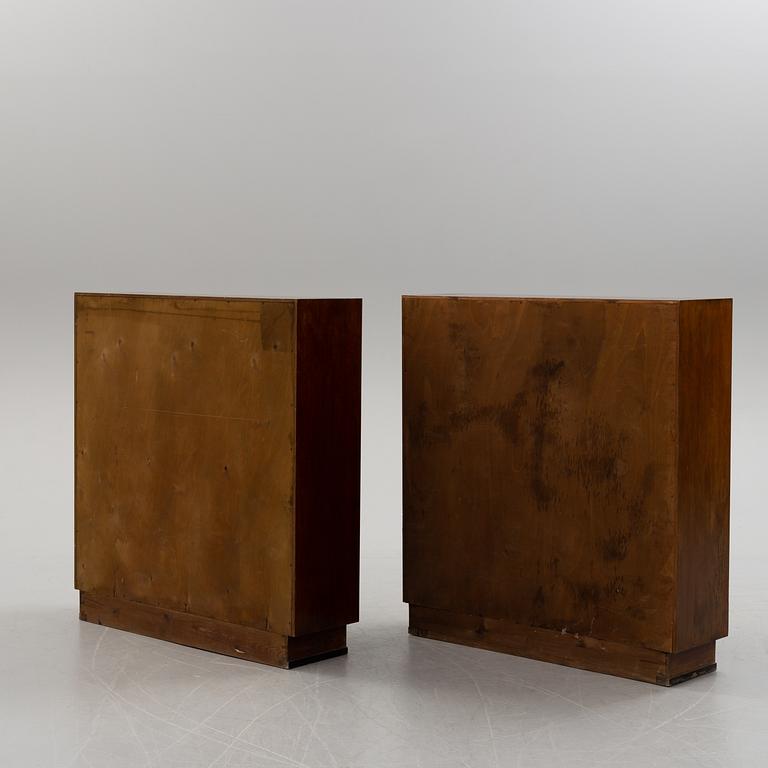A pair of 1930's birch art deco bookcases.