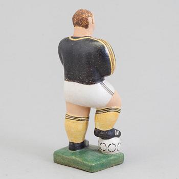 A Lisa Larson figure of a football player, Sweden.