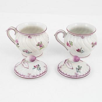 Seven porcelain cream cups, Höchst-like mark, first half of the 20th century.