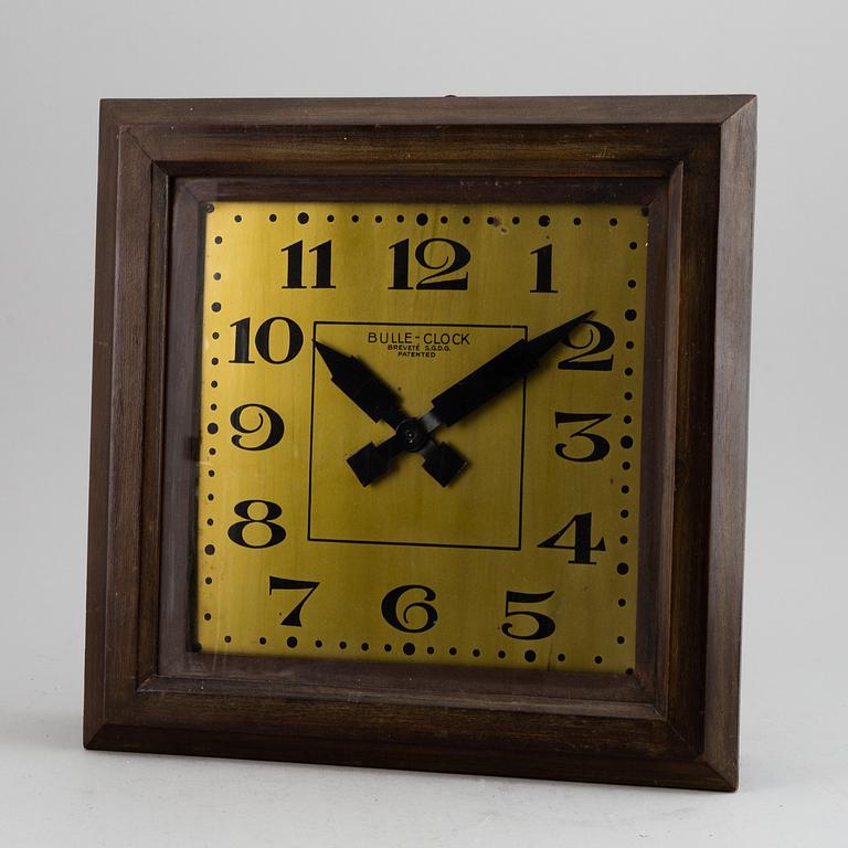 A wall clock, marked BULLE-CLOCK BREVETÉ S.G.D.G. Patented, first half of 20th Century.