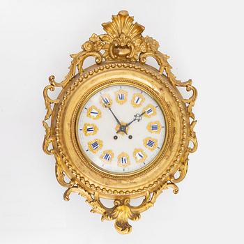 A wall clock, late 19th Century.