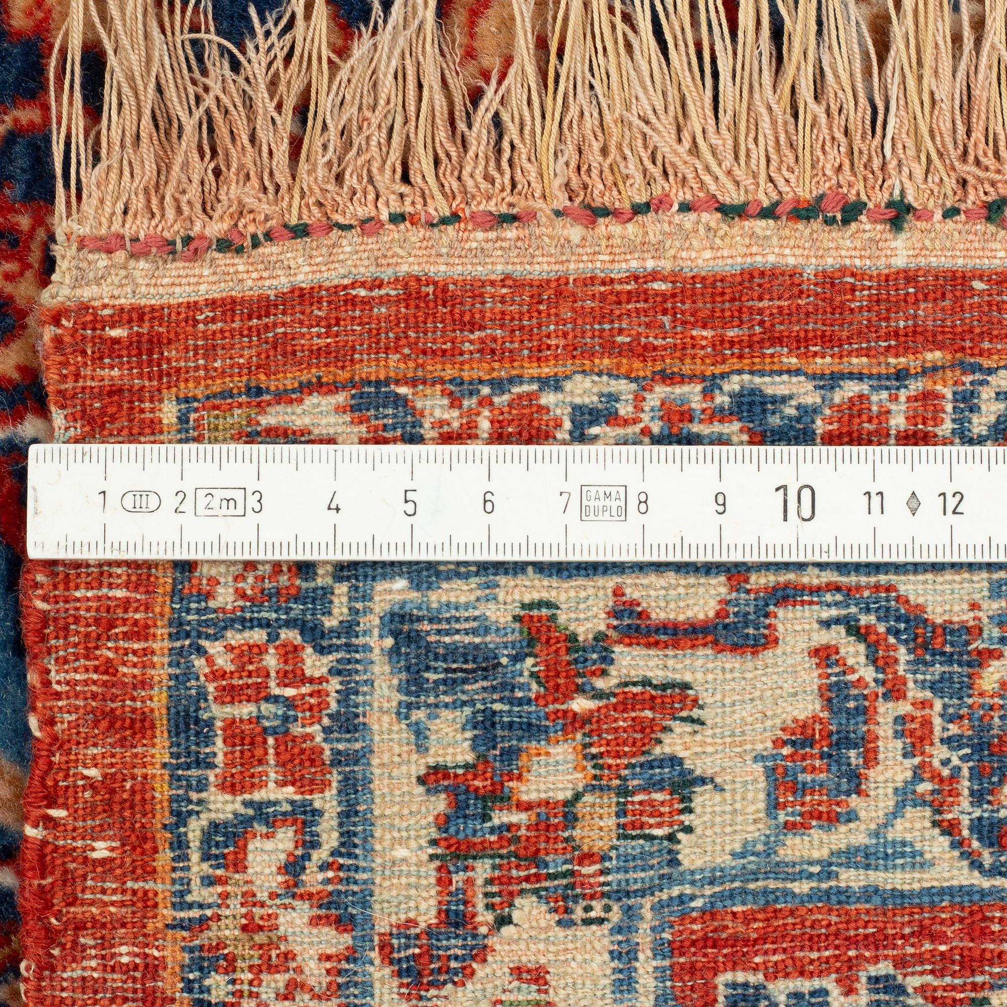 An antique Isfahan, ca 220 x 145 cm.