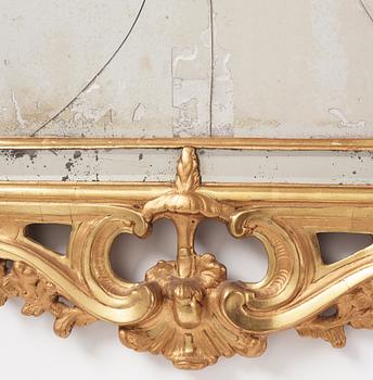 A Rococo giltwood mirror by N. Meunier (master in Stockholm 1754-97).