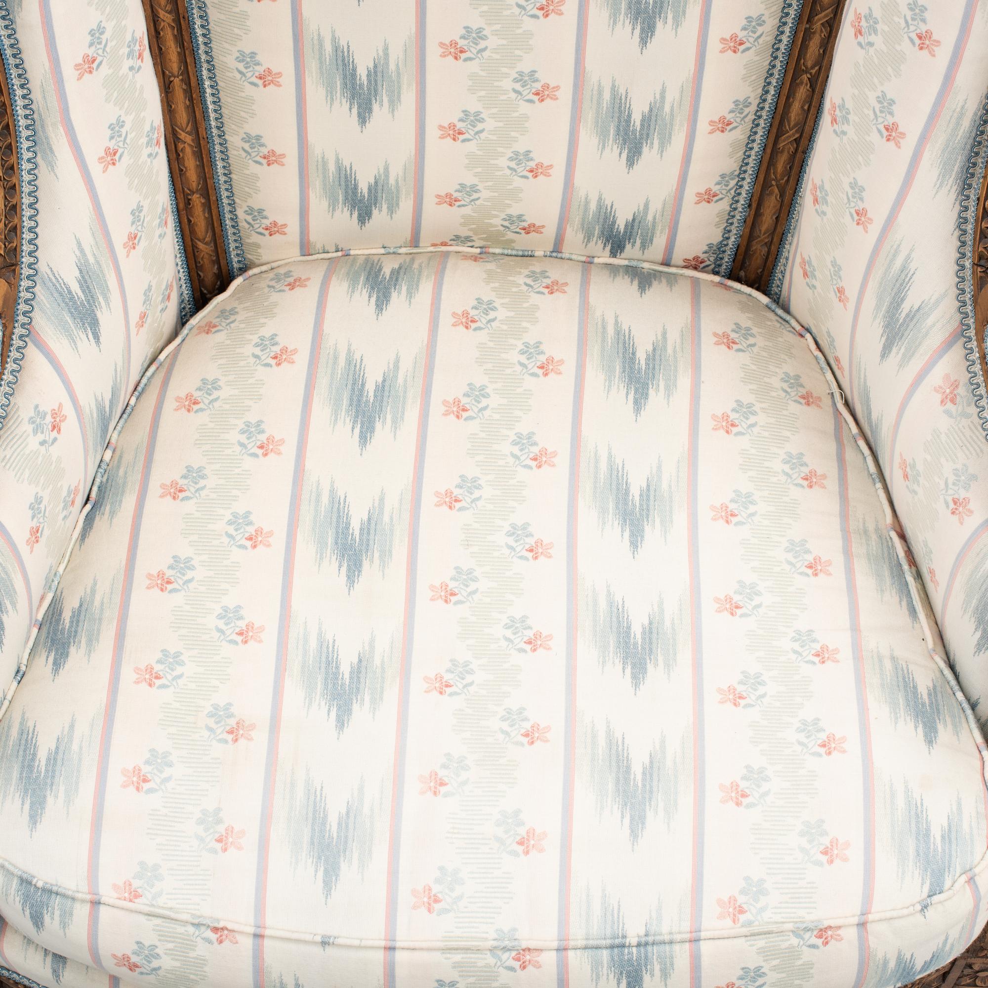 A Louis XVI-style bergere, late 19th century.
