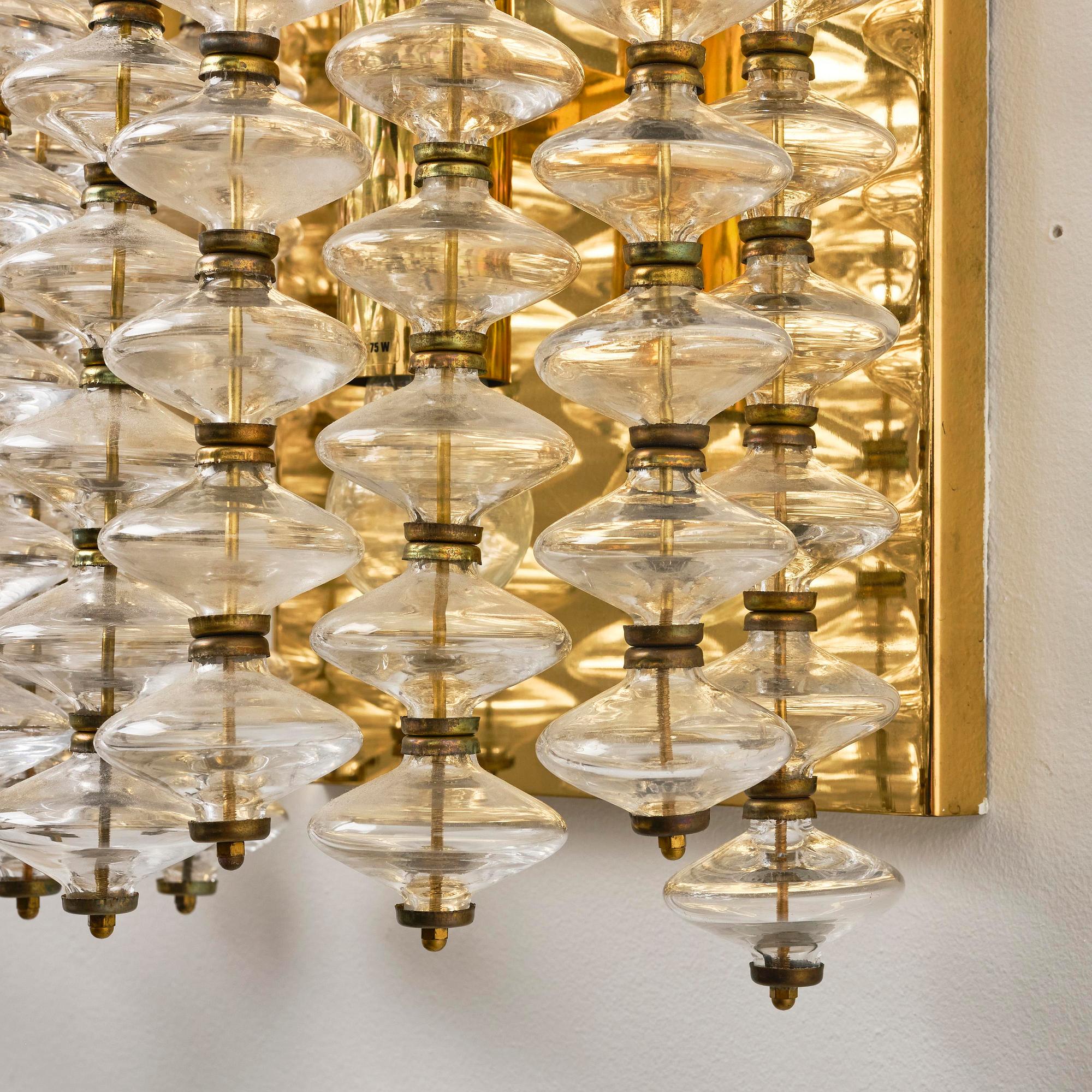 Hans-Agne Jakobsson, a pair of "Estrella" wall lights model "V 258", Hans-Agne Jakobsson AB, Markaryd, 1960s-70s.