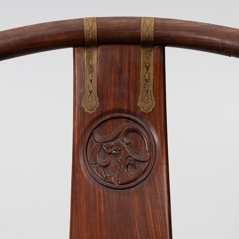 A Chinese hardwood folding chair, 20th century.